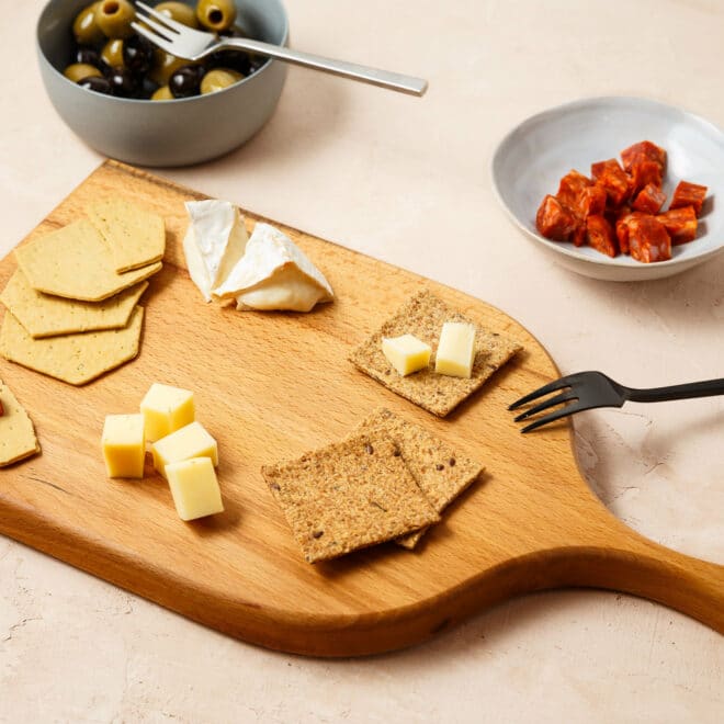 Metal Kitchen Thongs on Wooden Board Stock Image - Image of board, cheddar:  109759161