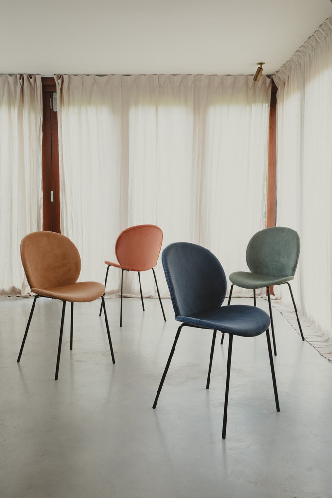 Group of the Bonnet chairs with black metal frame, ribcord fabric with texture.