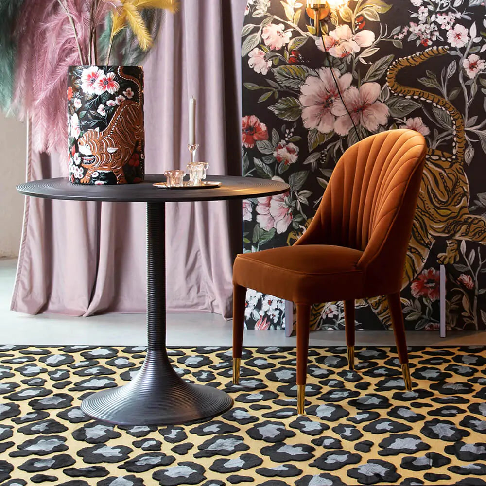 Hypnotising Round Dining Table Black in funky room setting