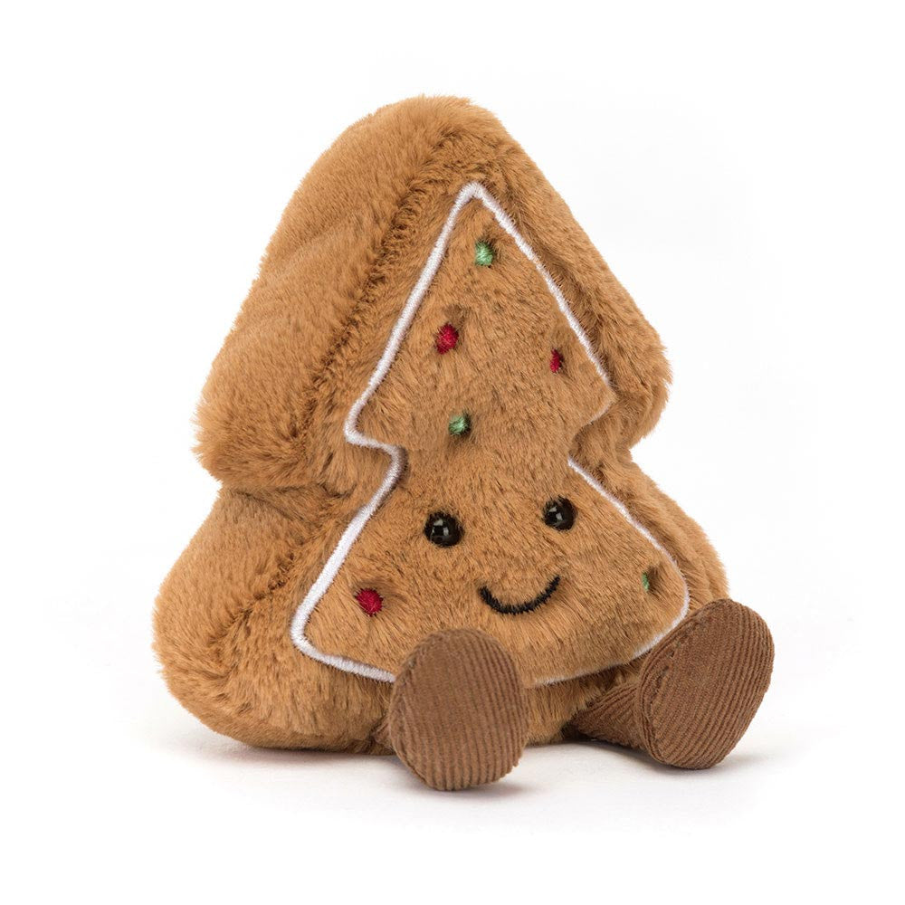 Lovingly detailed and full of Christmas fun, it's Amuseables Tree Cookie. This cheery biscuit is baked to perfection, with soft golden fur and chocolate cord boots. With cream embroidered piping and tiny stitch baubles in red and green, this cookie stays fresh, year after year.