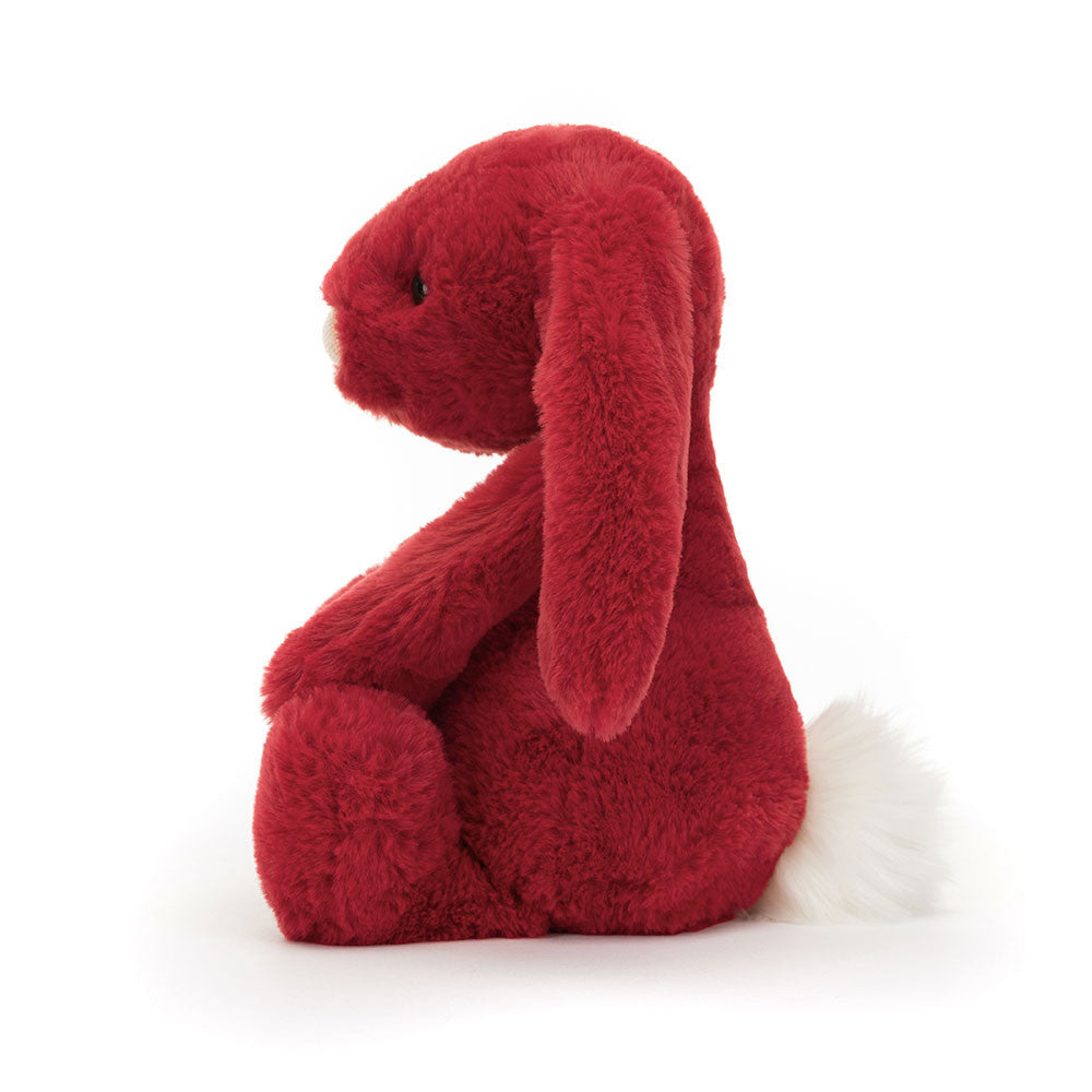 It's impossible not to nuzzle Bashful Luxe Bunny Scarlett. This divinely soft bunny has holly-berry fur and a white tufty bobtail. With bright, glossy eyes, cascading ears and a glittery-pink jersey nose, Scarlett is full of festive magic.