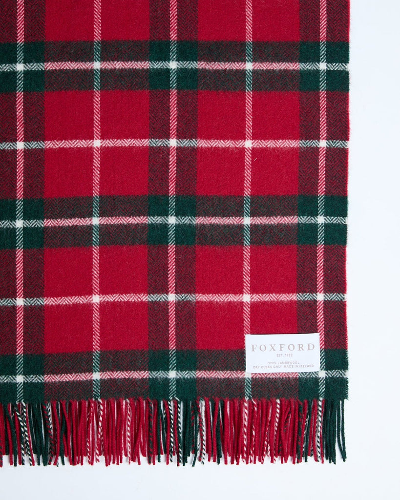 This luxurious throw is made from high-quality lambswool and features a classic check green pattern that adds an elegant touch to any space. It embodies sophistication and comfort, making it perfect for sleeping on chilly nights. You'll love wrapping yourself in it while enjoying your favourite book or sipping tea. This throw is crafted in our mill in County Mayo, a tradition we've upheld since 1892.