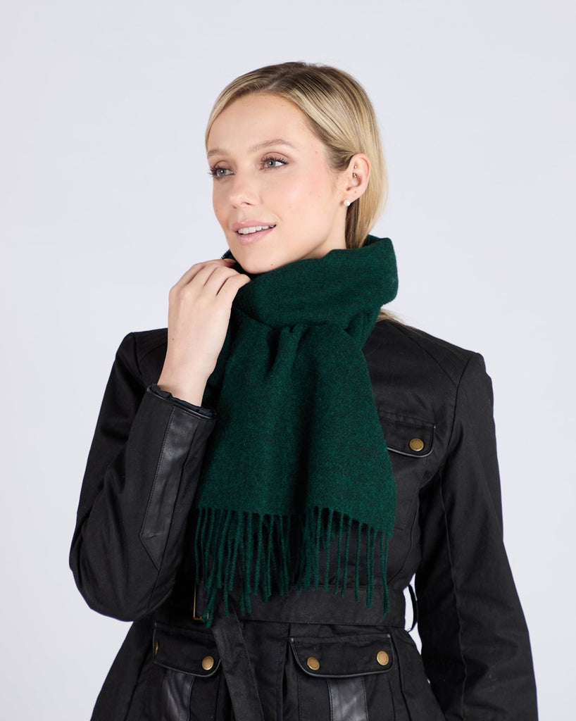 Expertly crafted using traditional weaving techniques, the Foxford Amazon scarf is a well-known design made from 100% lambswool. It is finished with a traditional roll fringe and features a rich autumnal green, inspired by the rural landscape surrounding our mill. This classic scarf in neutral grey-greens is the perfect addition to any wardrobe.

Each one is made in County Mayo and individually quality checked before leaving the mill.