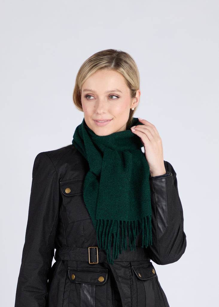 Expertly crafted using traditional weaving techniques, the Foxford Amazon scarf is a well-known design made from 100% lambswool. It is finished with a traditional roll fringe and features a rich autumnal green, inspired by the rural landscape surrounding our mill. This classic scarf in neutral grey-greens is the perfect addition to any wardrobe.

Each one is made in County Mayo and individually quality checked before leaving the mill.