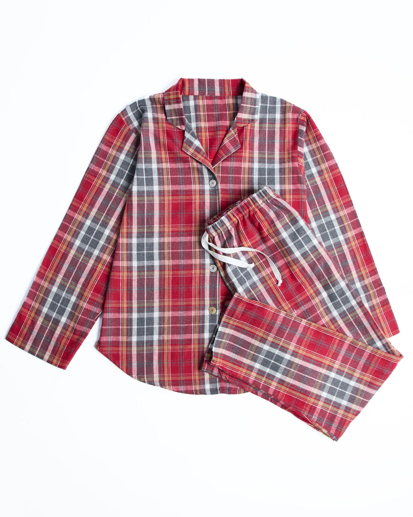 Our Foxford Tartan Pyjama is made from luxuriously soft flannel, these pyjama standard set &nbsp;provide a sumptuous sleeping experience that will leave you feeling cozy and well-rested. Traditional tartan checks give these pyjamas a timeless charm.&nbsp;

Crafted from brushed cotton flannel, the set offers a soft and breathable feel. The button-down top features a neat revere collar, alongside a full-length pair of bottoms with an elasticated waistband and side pockets.