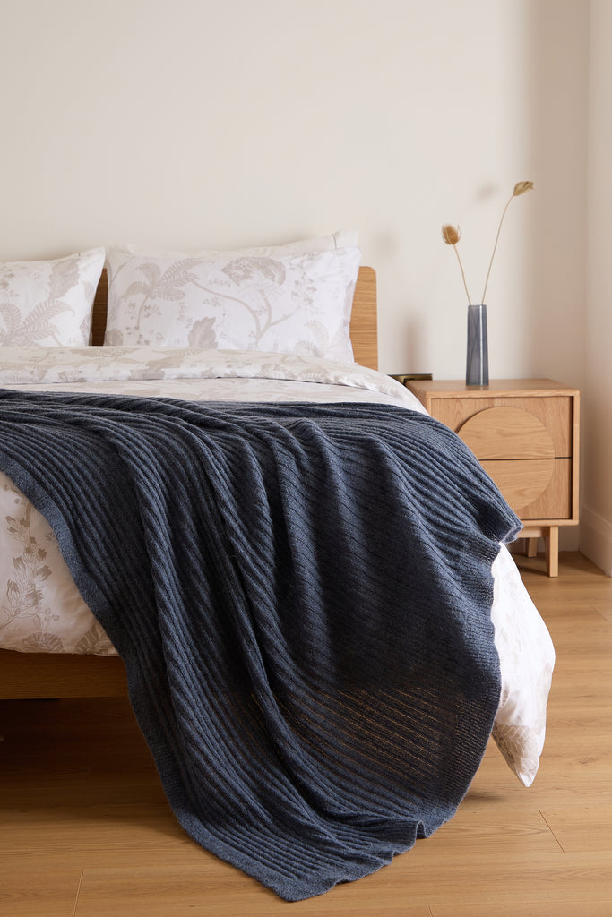 Denim knitted bed blanket, 150x200cm, mohair blend, ribbed texture, designed in Ireland, woven in Portugal.