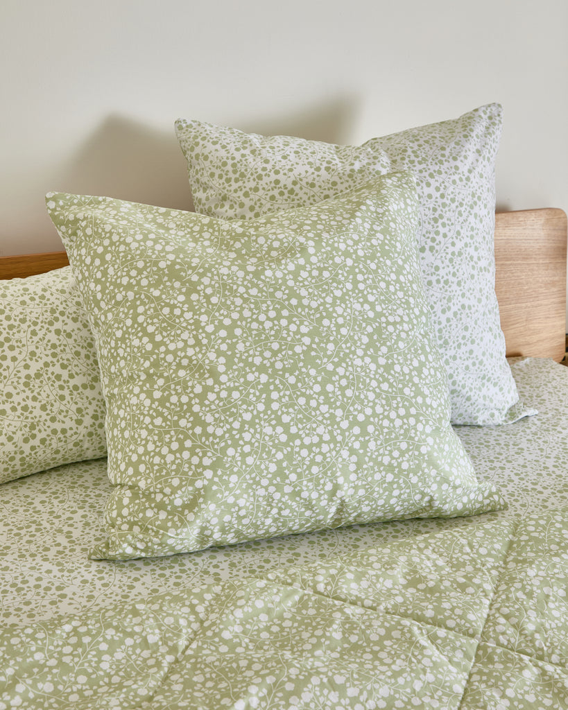 Enhance your home's sophistication with Foxford's Lucy Cushion, a compact and versatile addition from our SS25 collection. This 60x60cm cushion boasts an elegant sage green floral design, perfect for complementing any interior style. It was meticulously crafted in Ireland and created using 100% cotton to provide comfort and luxury. Ideal for your sofa, armchair, or bed, the timeless Irish design of the Lucy Cushion will elevate your living space.