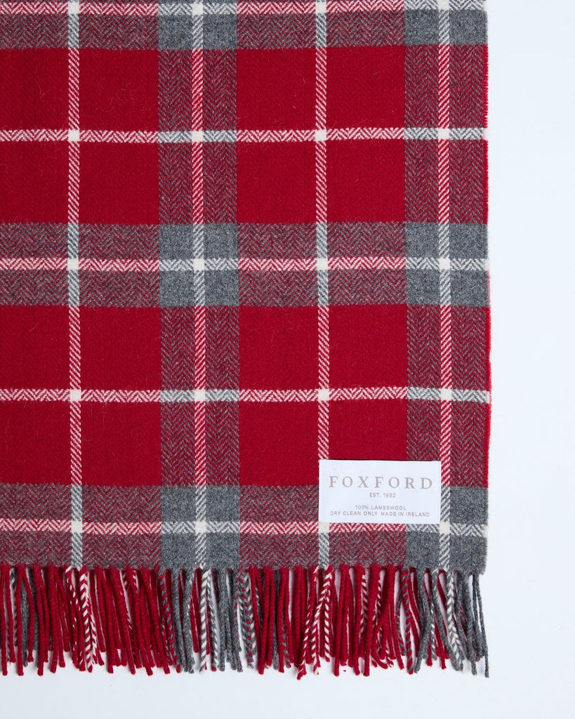 This luxurious throw is made from high-quality lambswool and features a classic check-grey pattern that adds an elegant touch to any space. It embodies sophistication and comfort, making it perfect for sleeping on chilly nights. You'll love wrapping yourself in it while enjoying your favourite book or sipping tea. This throw is crafted in our mill in County Mayo, a tradition we've upheld since 1892.