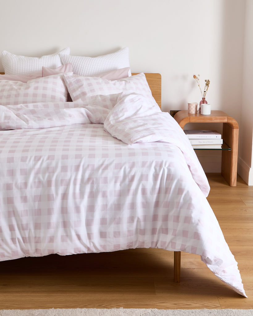 Close-up of Foxford Aoife Duvet Set, showing 180-thread count cotton with a soft pink and white gingham pattern.