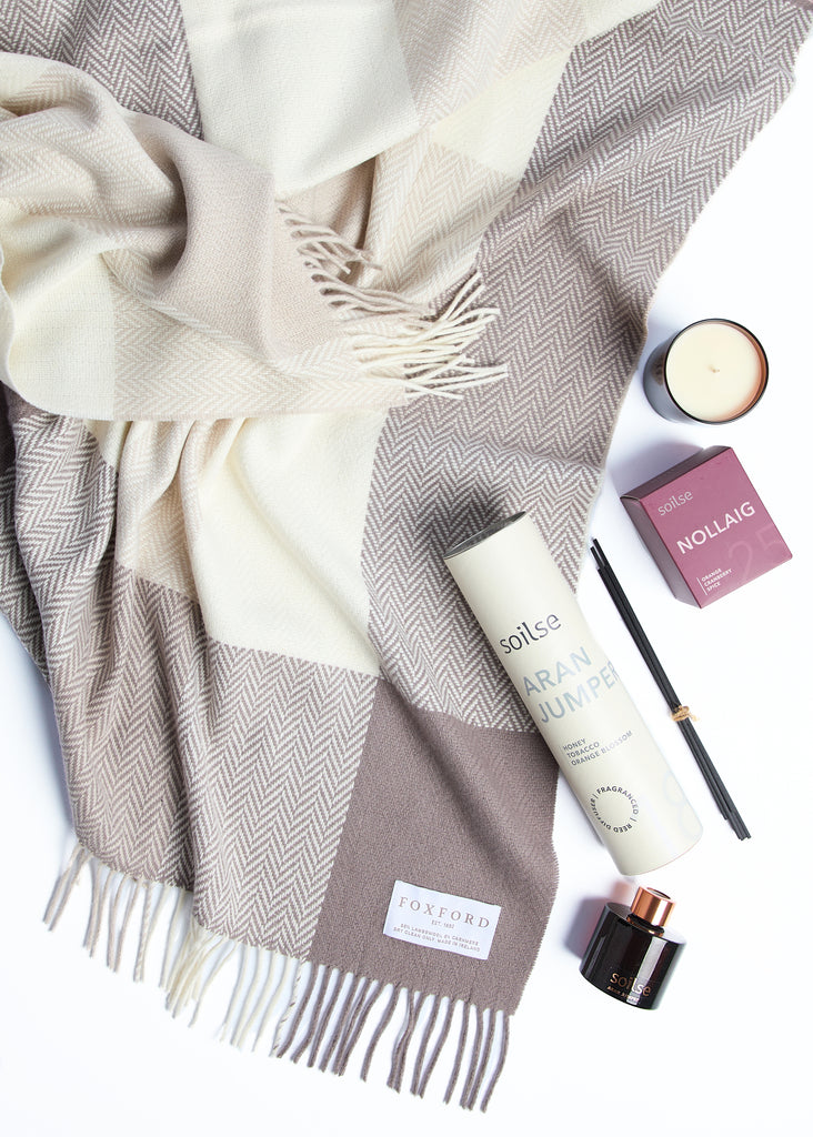 Indulge in a sense of refinement with the FOXFORD Home Cashmere Bundle. This elegant set includes the exquisitely made Dún na Rí Throw, renowned for its luxurious texture and cozy warmth, along with a calming Soilse diffuser and soothing Soilse Nollaig candle. Carefully packaged in a complimentary FOXFORD gift box, this bundle makes for an ideal present that brings a touch of Irish-made comfort and relaxation to any household.