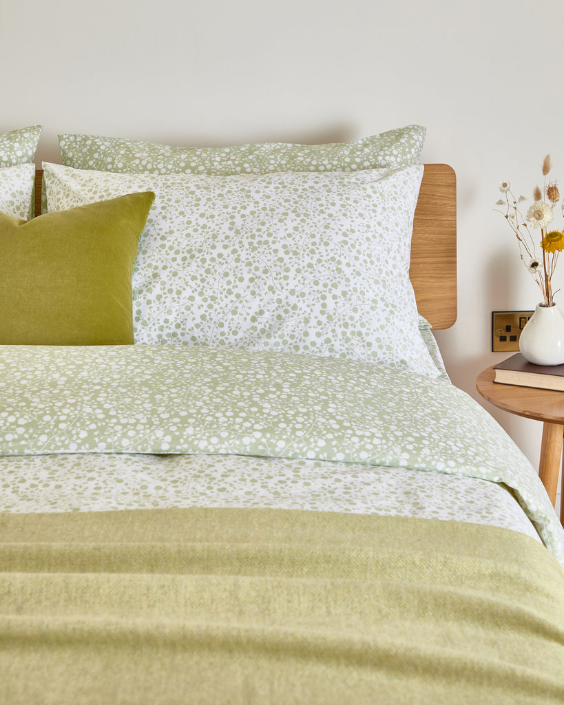 Complete your bedroom with the Foxford Lucy Pillowcase Set in a serene sage green floral design. Part of our SS25 Everyday Collection, these pillowcases are crafted with a soft 180-thread count for everyday comfort and timeless style. Designed in Ireland with a focus on quality and attention to detail, the Lucy Pillowcase Set perfectly complements the matching duvet and fitted sheet. Bring a touch of nature and effortless elegance to your home with this beautifully crafted set, perfect for enhancing any bed