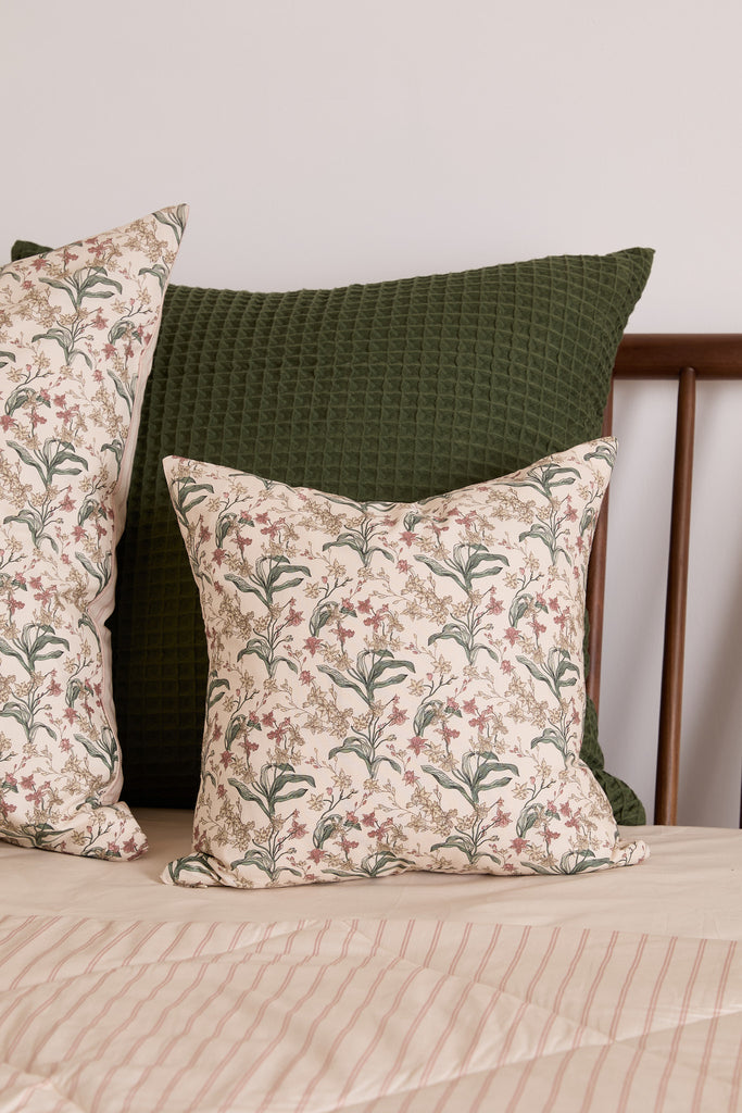 Discover pure luxury with the Foxford Romantic Blossom print. This elegant cushion, designed by Irish designer Helen McAlinden, boasts a gorgeous blossom print to enhance your bedding collection. With peach, pink, and green hues, it's the newest addition for the summer of 2024 and guarantees the highest quality and comfort, as expected from Irish bedding. Combine it with the Romantic Blossom Duvet Set and Quilted Blanket for a complete bedding set.