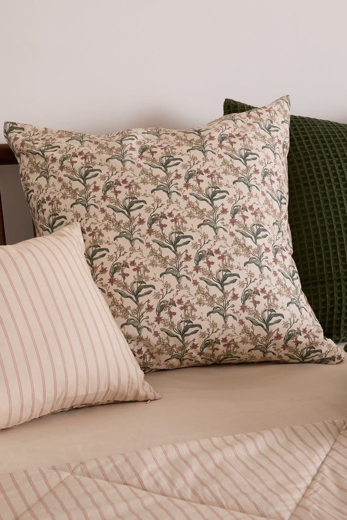 Experience the ultimate in luxury with the Foxford Romantic Blossom print. A new addition for the summer of 2024, this cushion features a stunning blossom print in shades of peach, pink, and green. It was designed by the renowned Irish designer Helen McAlinden, ensuring top-quality and comfort synonymous with Irish bedding. For a complete bedding ensemble, pair it with the Romantic Blossom Duvet Set and Quilted Blanket.