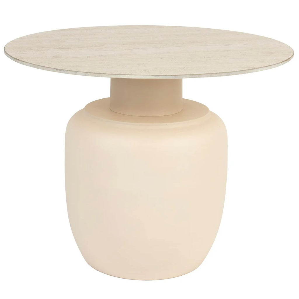 Casa Side Table is a harmonious blend of natural design elements. Its ceramic tabletop boasts a beautiful travertine look, harmonizing effortlessly with the metal base. The soothing beige hue and organic round shape make this series a perfect addition to your living space.