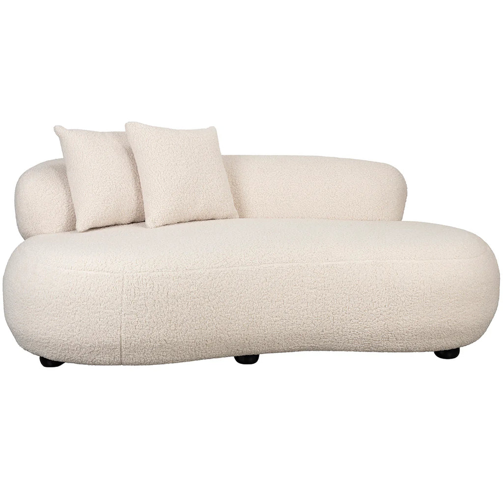 Experience pure luxury with the Foxford Cloud Bouclé Sofa. Its sleek and modern design instantly elevates any living space, while the curved shape and white color add a touch of sophistication. Unwind and relax in ultimate comfort with this exclusive piece.