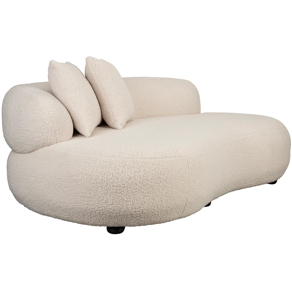 Experience pure luxury with the Foxford Cloud Bouclé Sofa. Its sleek and modern design instantly elevates any living space, while the curved shape and white color add a touch of sophistication. Unwind and relax in ultimate comfort with this exclusive piece.