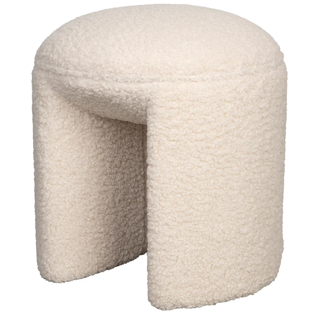 The Foxford Cloud Bouclé Stool offers a seamless combination of both comfort and style. Its trendy and chic design is sure to elevate any living space. With its crisp white bouclé upholstery, also known as teddy fabric, this stool exudes elegance. The foam seat ensures a comfortable sitting experience, making it the perfect spot to unwind and relax. Its organic contours and light appearance make it effortless to move as needed, providing an extra touch of convenience to any room.