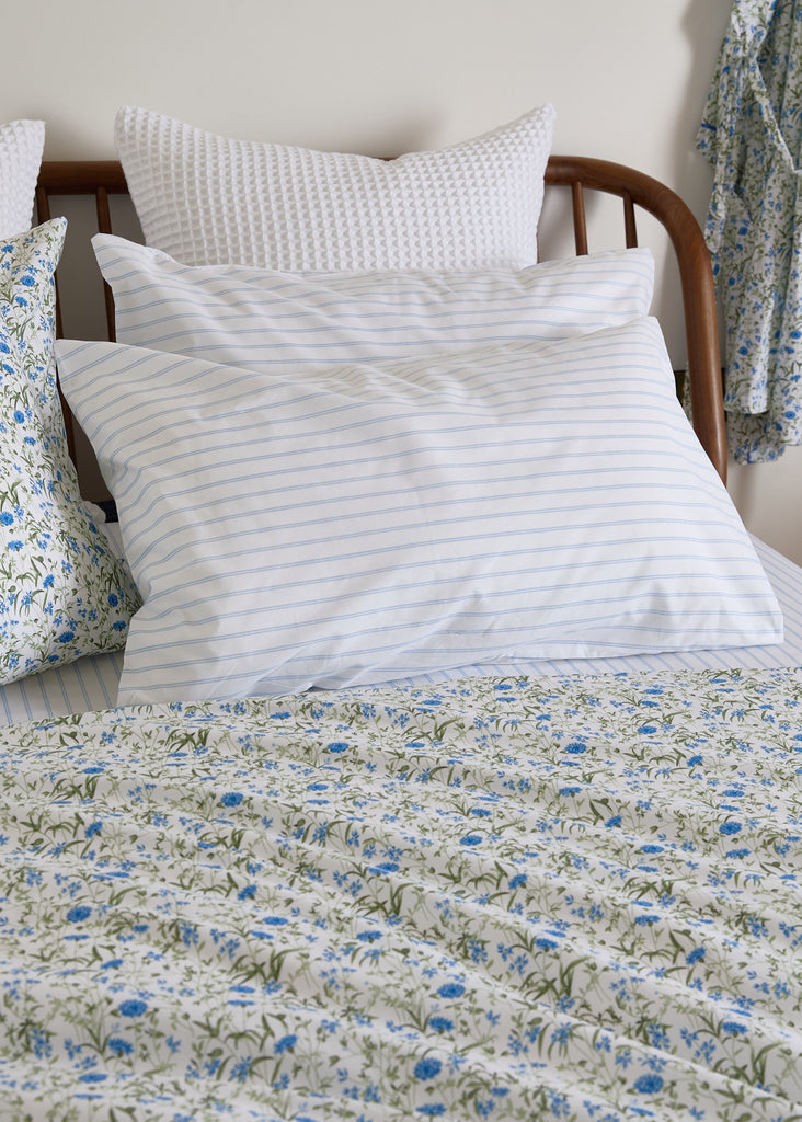 Experience a serene, rhythmic ticking design with the Foxford Pinstripe Pillowcase Set. This set is expertly crafted in Portugal from 180-thread-count cotton, creating a luxurious and elegant texture. Each set includes two Pillowcases for ultimate comfort.