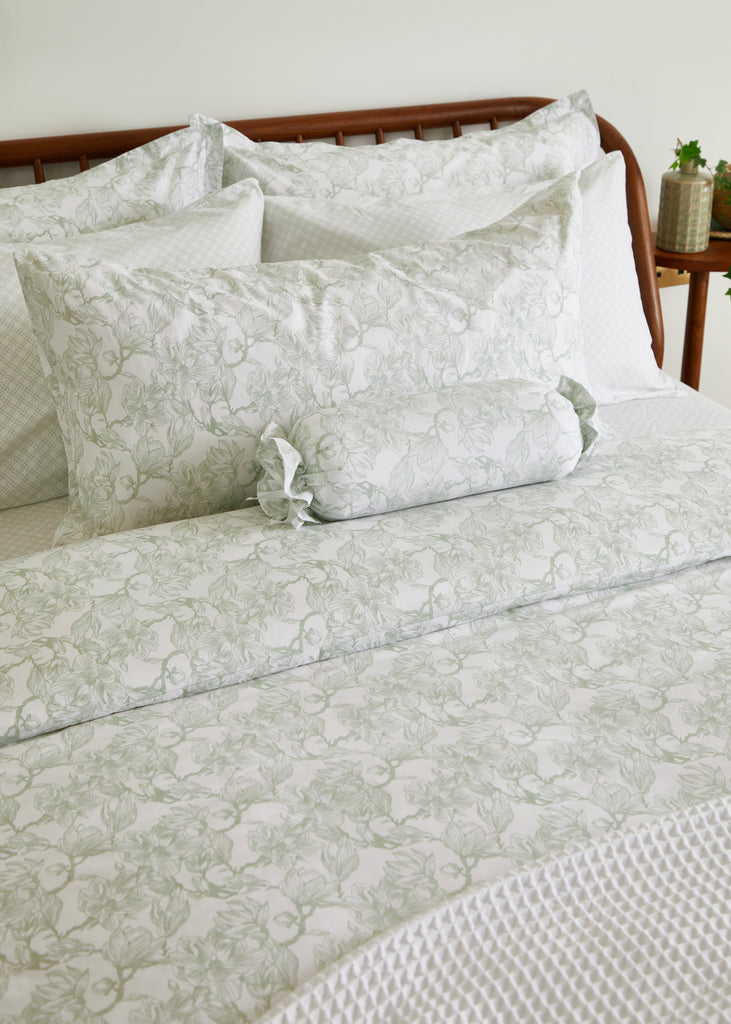 Elevate your bedroom with the Foxford Sage Magnolia King Pillowcase. Crafted from 100% cotton, this pillowcase features a serene sage magnolia pattern that adds a touch of elegance to any decor. Its luxurious texture ensures a comfortable and restful night's sleep. Perfectly sized for king pillows, this pillowcase combines style and comfort for a truly sophisticated bedding experience.