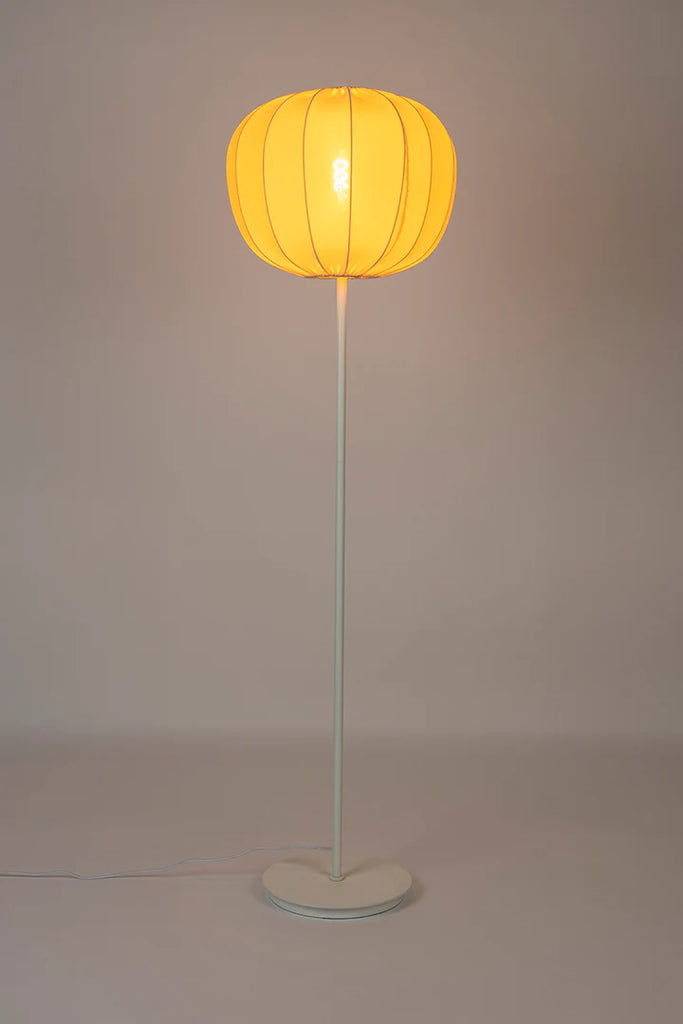 Take a bold leap in your home decor with the Foxford Shannon Floor Lamp! Standing tall at 160cm and boasting a 45cm diameter, this unique piece will make a daring statement in any room. Featuring a warm and cozy glow from its textile shade (made of 85% polyester and 15% cotton), and a touch of industrial style from its white iron body and base, this lamp also adds a hint of coastal adventure with its white oyster shell design.