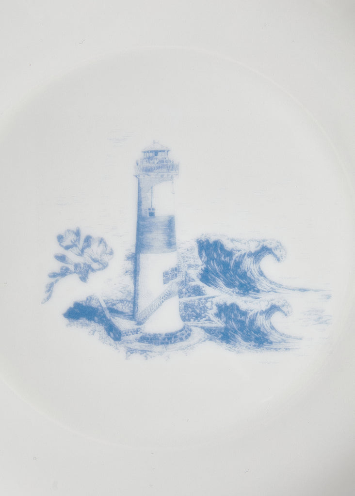 The Foxford Lighthouse Side Plate print was designed in collaboration with designer Ruth Gallagher. It features hand-drawn illustrations of iconic symbols from the Wild Atlantic Way.  The timeless printed design is presented in ocean blues, capturing the essence of this stunning coastal region. Experience the extraordinary beauty of Ireland's iconic landscape.