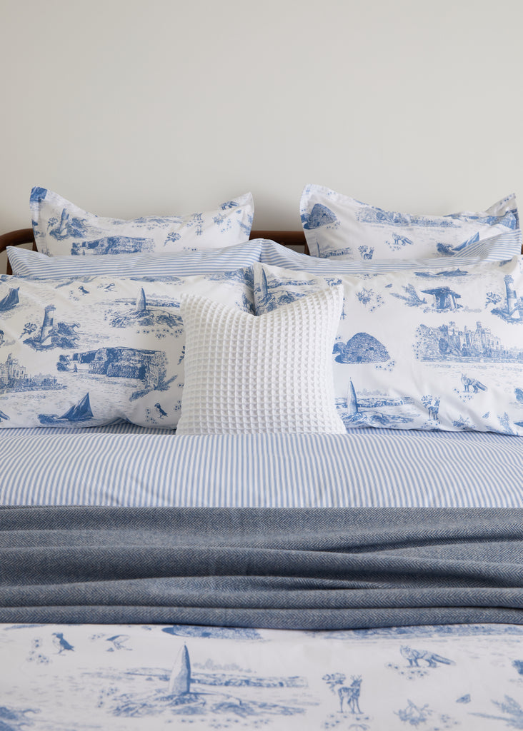 The Foxford Wild Atlantic Duvet Set was designed in collaboration with textile designer Ruth Gallagher. It features hand-drawn illustrations of iconic symbols from the Wild Atlantic Way.