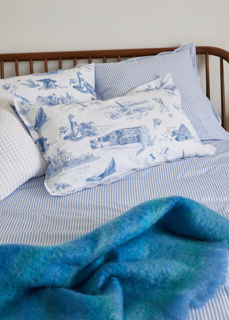 Relax and drift off to sleep with our stunning Wild Atlantic print. Created in partnership with textile designer Ruth Gallagher and skillfully crafted in Portugal, this Oxford Pillowcase is 100% cotton for a luxurious, durable feel.  Single Pillowcase