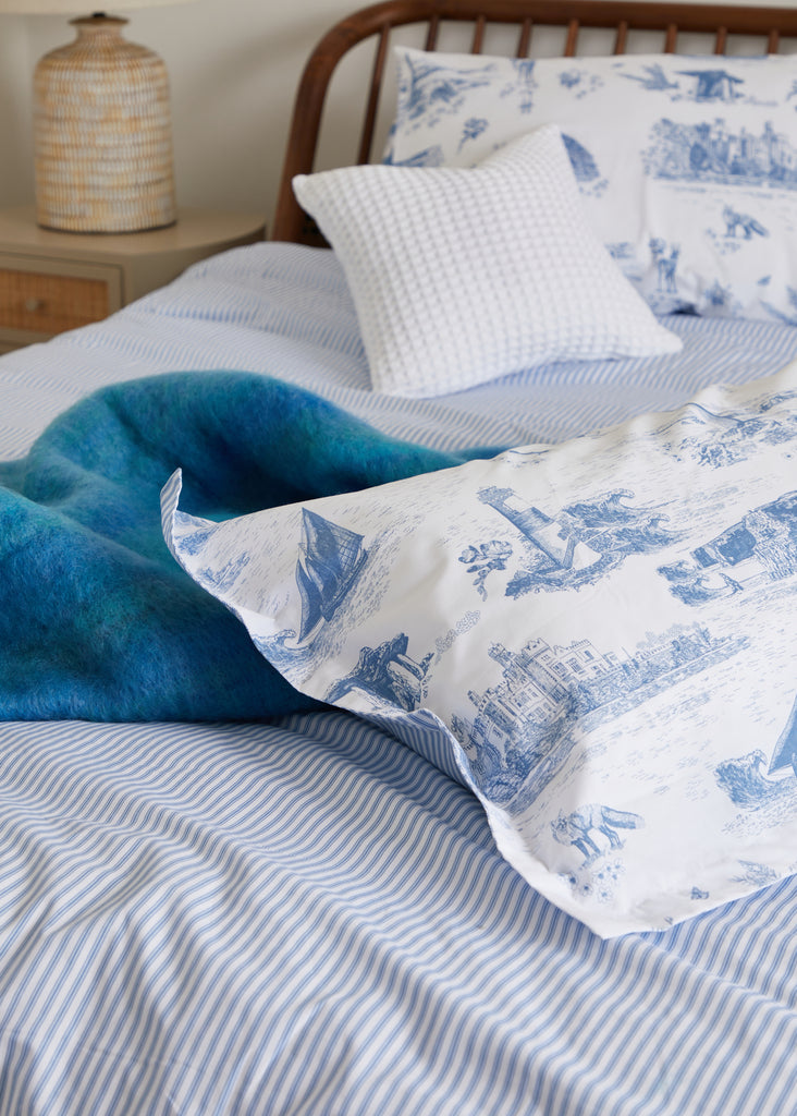 Relax and drift off to sleep with our stunning Wild Atlantic print. Created in partnership with textile designer Ruth Gallagher and skillfully crafted in Portugal, this Oxford Pillowcase is 100% cotton for a luxurious, durable feel.  Single Pillowcase