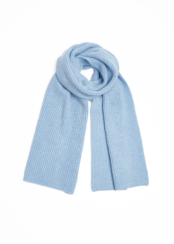 Crafted from the finest cashmere fibers, this unisex blue scarf features a timeless ribbed design, making it the perfect accessory for any outfit. Soft to the touch and effortlessly elegant, this knitted scarf is a must-have addition to any luxury wardrobe.