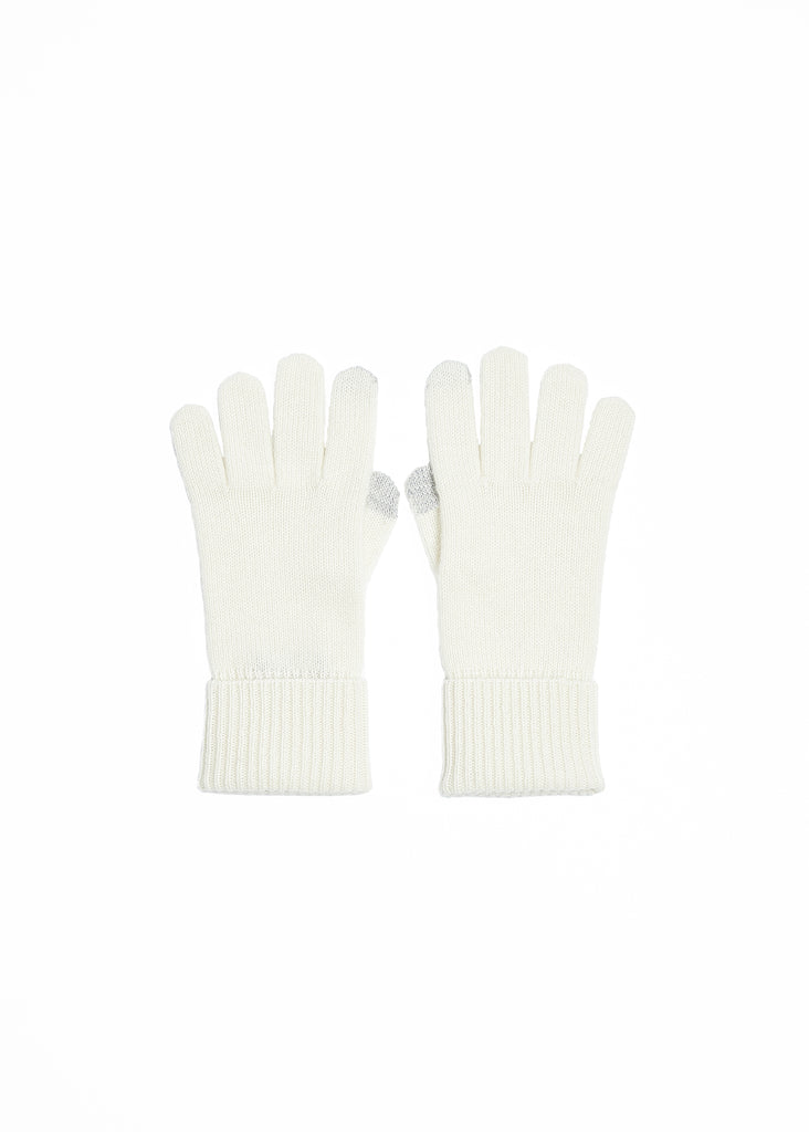 Our unisex white gloves are crafted from 100% pure cashmere, featuring a ribbed cuff and providing the ultimate in cold-weather opulence. The insulating texture of cashmere will keep your hands warm and cozy, whether you're commuting to the office or exploring a winter wonderland. These gloves will elevate your style while keeping you comfortably shielded from the cold.  Foxford White Cashmere Gloves made with conductive thread on the index finger and thumb, allowing for ease of messaging while maintaining 