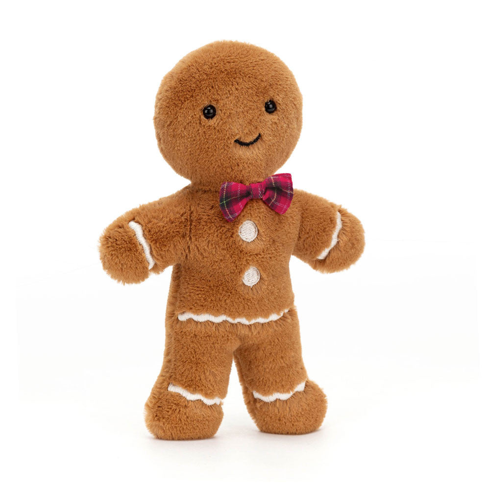 Jolly Gingerbread Fred may have hopped straight out of the tin, but this guy's always looking smart! In soft golden biscuit fur with scalloped stitch icing, embroidered buttons and a red tartan bow, Fred is a forever festive friend