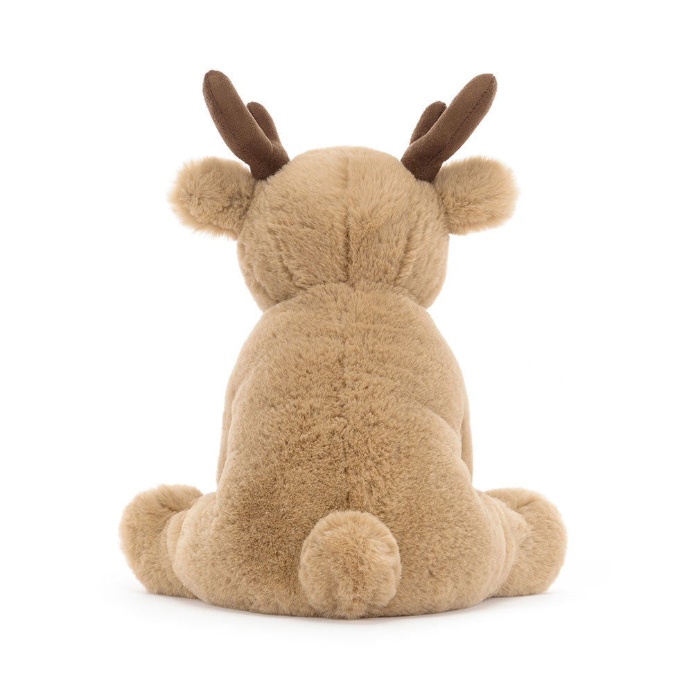 Romi Reindeer brings sleigh-loads of festive joy. This scrumptious honey deer has huge weighted paws and suedette antlers in rich cocoa tones – not to mention their delicate tufty tail, cranberry nose and waggle ears. A Christmas companion for long drives and post-dinner naps.