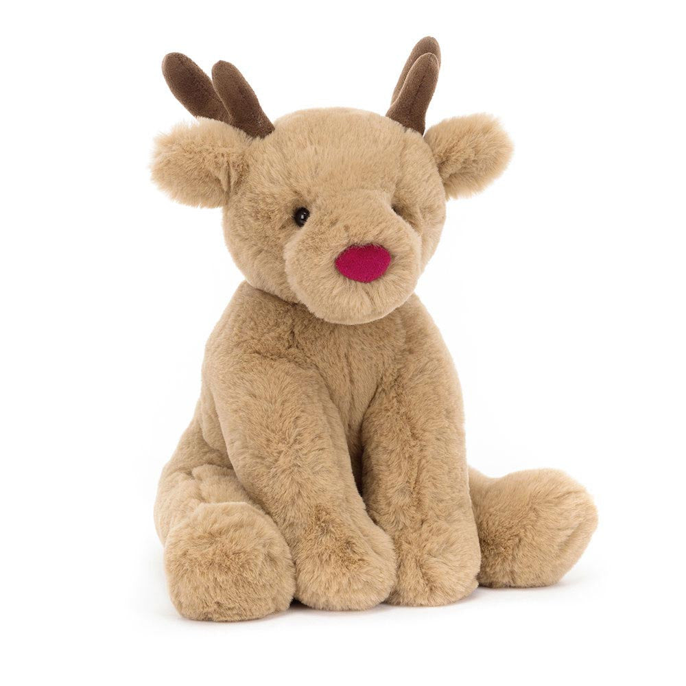 Romi Reindeer brings sleigh-loads of festive joy. This scrumptious honey deer has huge weighted paws and suedette antlers in rich cocoa tones – not to mention their delicate tufty tail, cranberry nose and waggle ears. A Christmas companion for long drives and post-dinner naps.