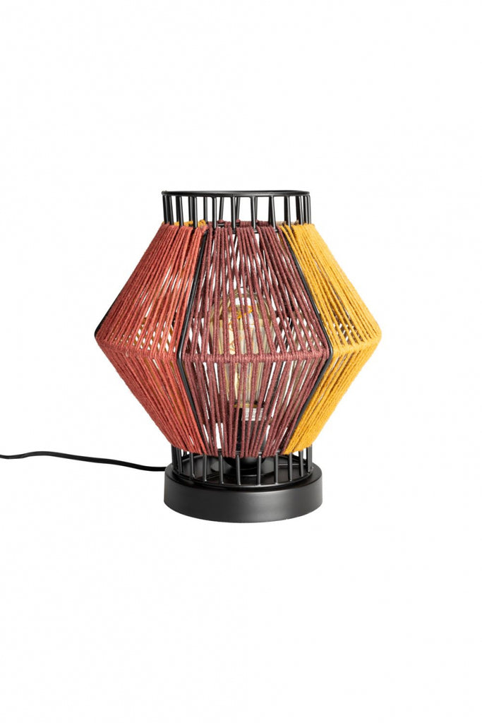 With the Dutchbone Surya, you can easily add warmth and colour to your interior. The lamp and mirrors in this series have a base of black metal wrapped with colourful rope in different planes. Surya means 'sunbeam' and this is clearly reflected in the warm colour combination, reminiscent of the romantic colours of a sunset. At the same time, the cheerful colour areas take you back to the funky feel of the 70s, giving the items a playful, retro look. The perfect way to add character to your interior and crea