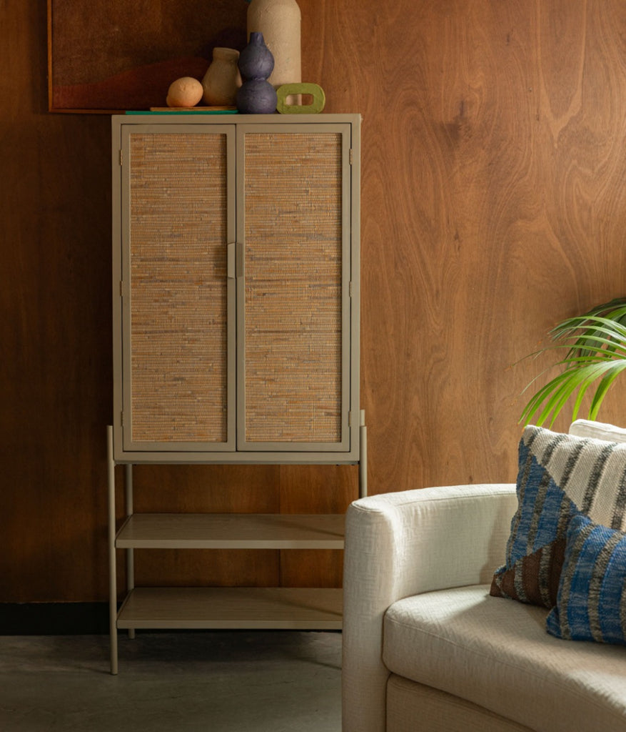 Want to transform your interior into a warm space where you can relax? If so, the Dutchbone Yasu series will soon bring the atmosphere you're looking for into your home. The furniture in this series has a pleasing, natural look. This is thanks to the matt finish and the rattan-effect doors and drawers. This also ensures that your things are neatly stored out of sight, which instantly makes your interior look tidier and calmer. Something else to note is that the iron base has the same colour and finish as th